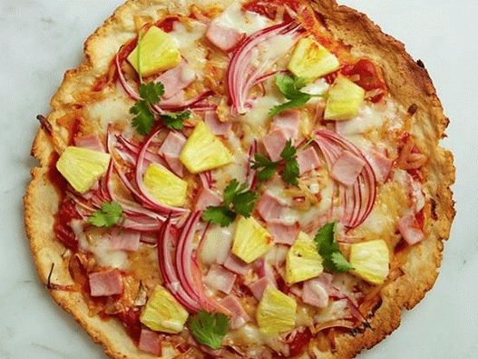 “照片无麸质披萨配火腿和菠萝”