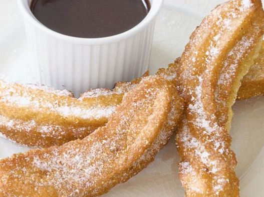 “来自玉米松饼面团的Churros照片”