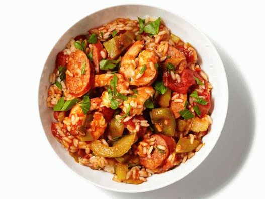 “Jambalaya在慢炖锅中的照片”