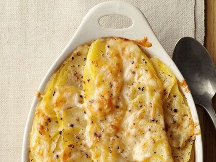 “照片马铃薯焗奶酪和奶油”