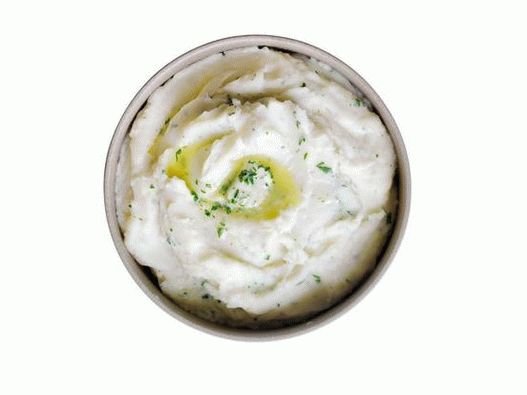“照片用绿色黄油捣碎土豆”